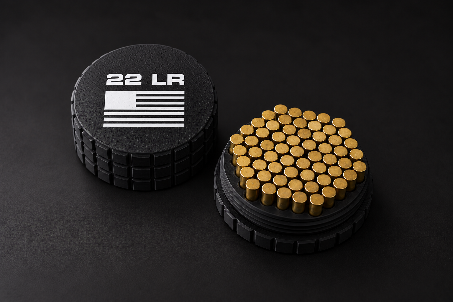 Black BattleBox 22 LR Round Vault with white lettering and flag, with its loaded holder on a black background