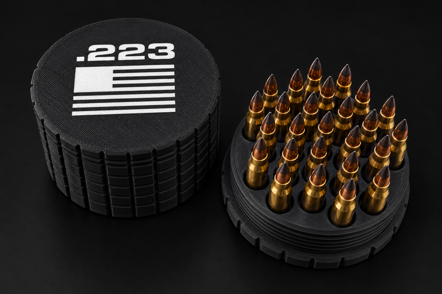 Black BattleBox 223 REM Round Vault with white lettering and flag, with its loaded rifle cartridge holder on a black background