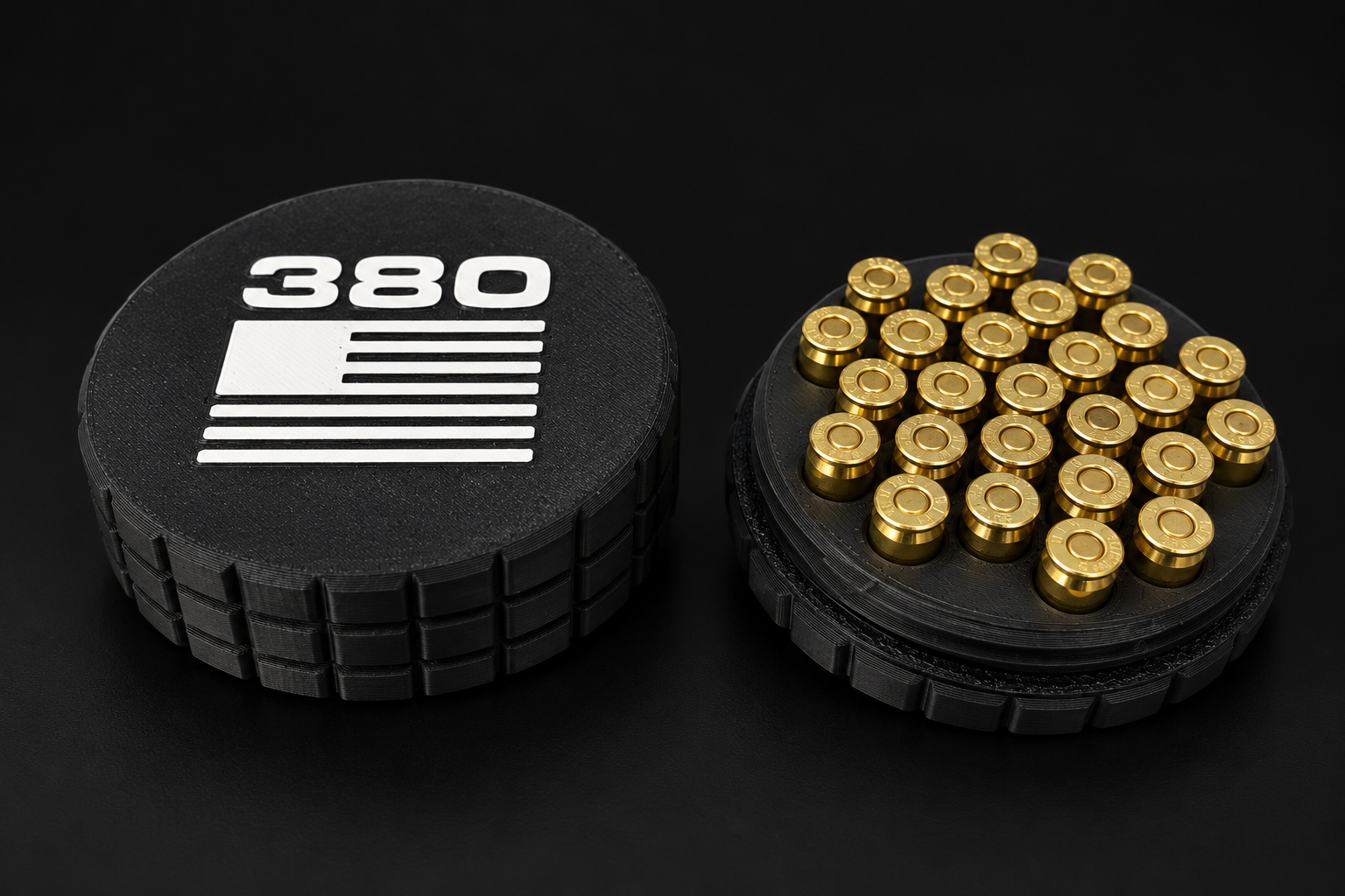 Black BattleBox 380 ACP Round Vault with white lettering and flag, with its loaded holder on a black background