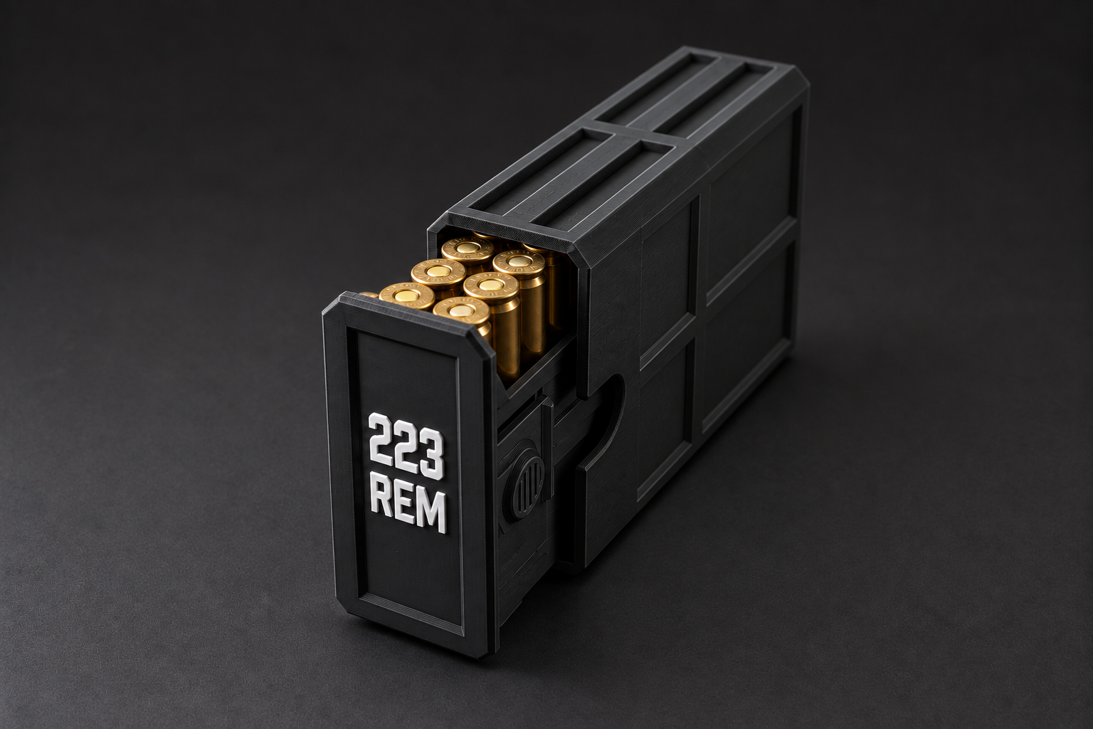 Black 223 Stackable Vault with brass cartridges in an open sliding tray