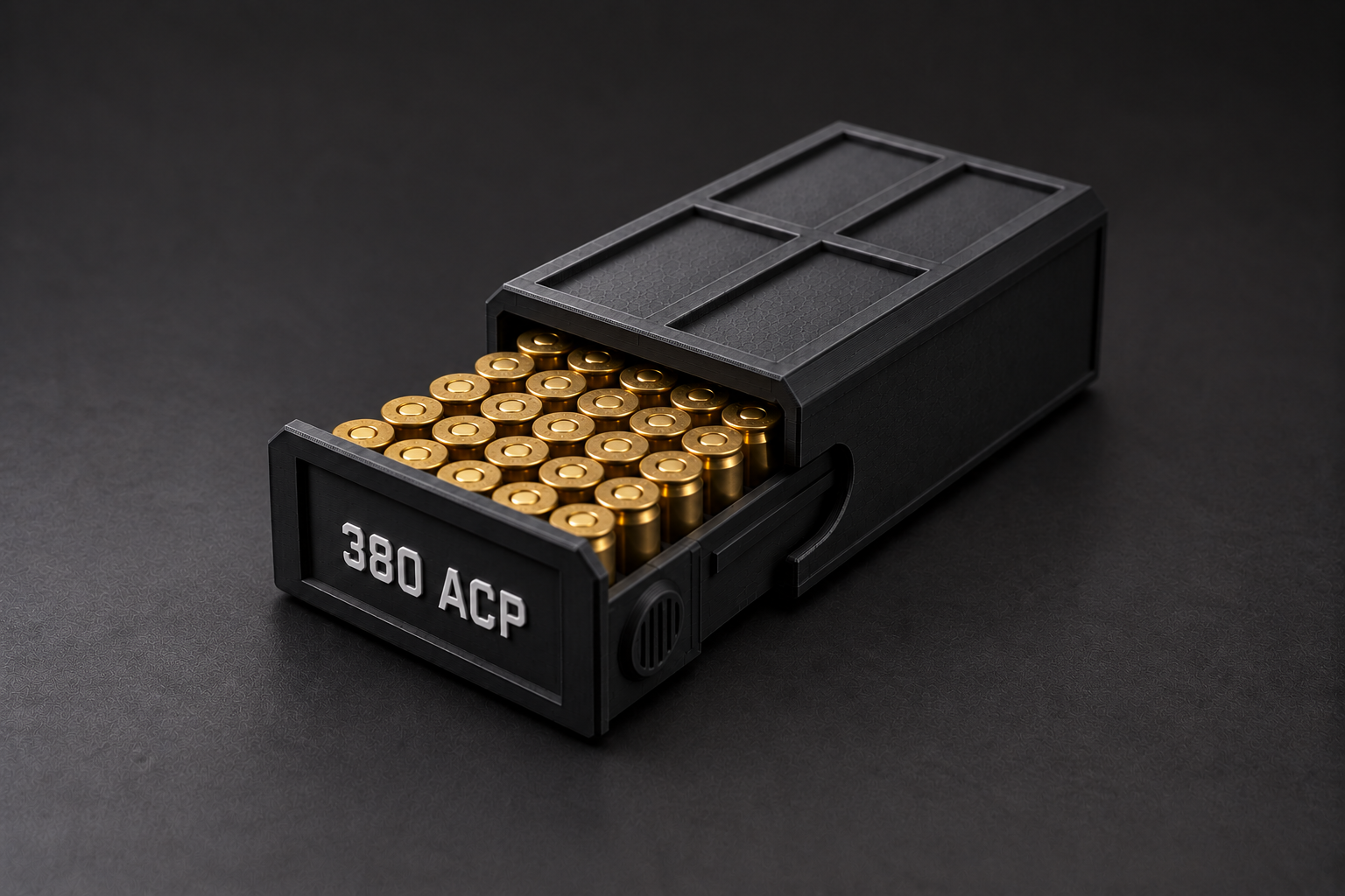 Black BattleBox 380 ACP Stackable Vault with white lettering and a loaded open tray on a black background